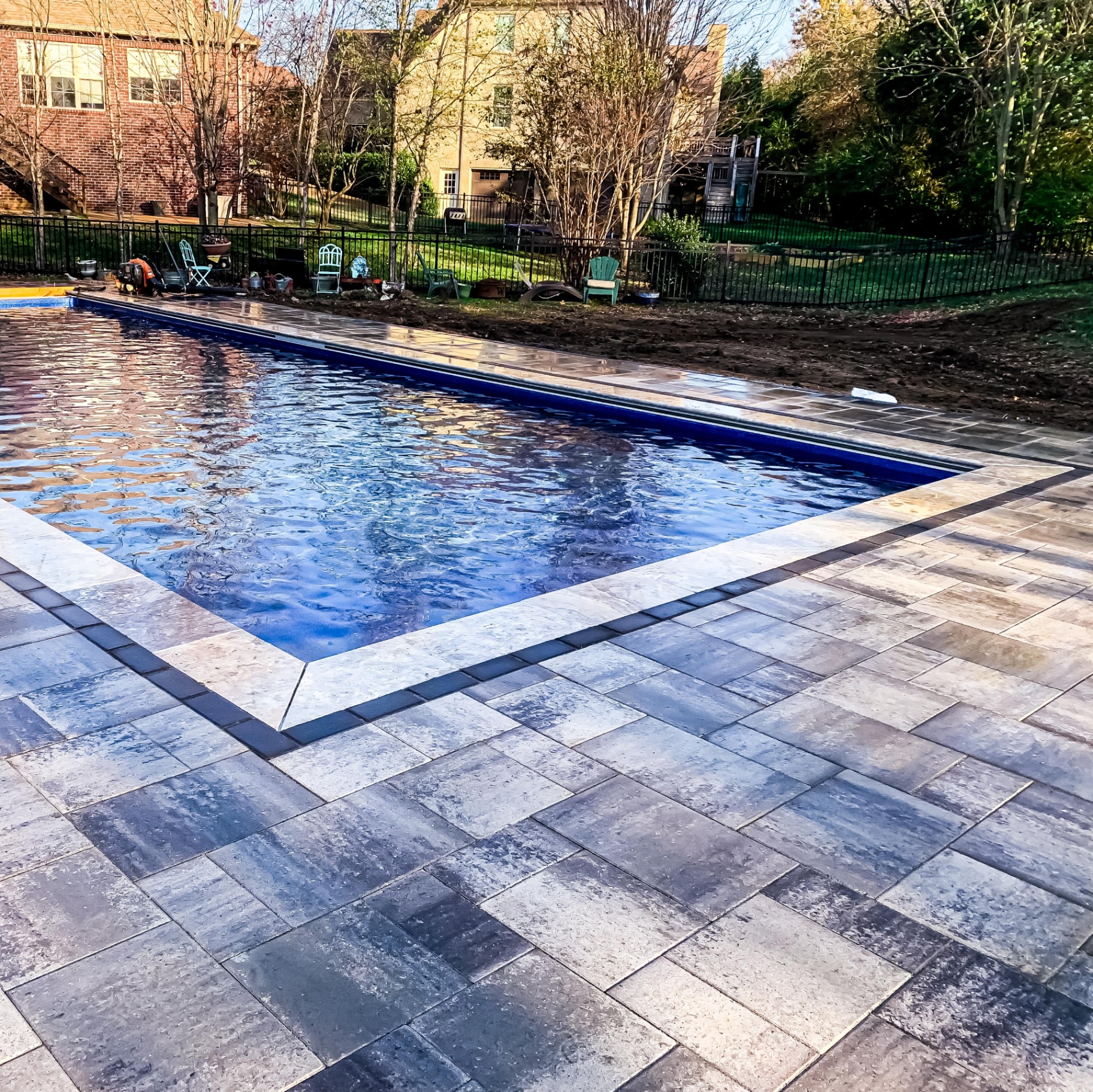 Custom paver stone patio with outdoor living area in Tennessee backyard by Prestige Landscape